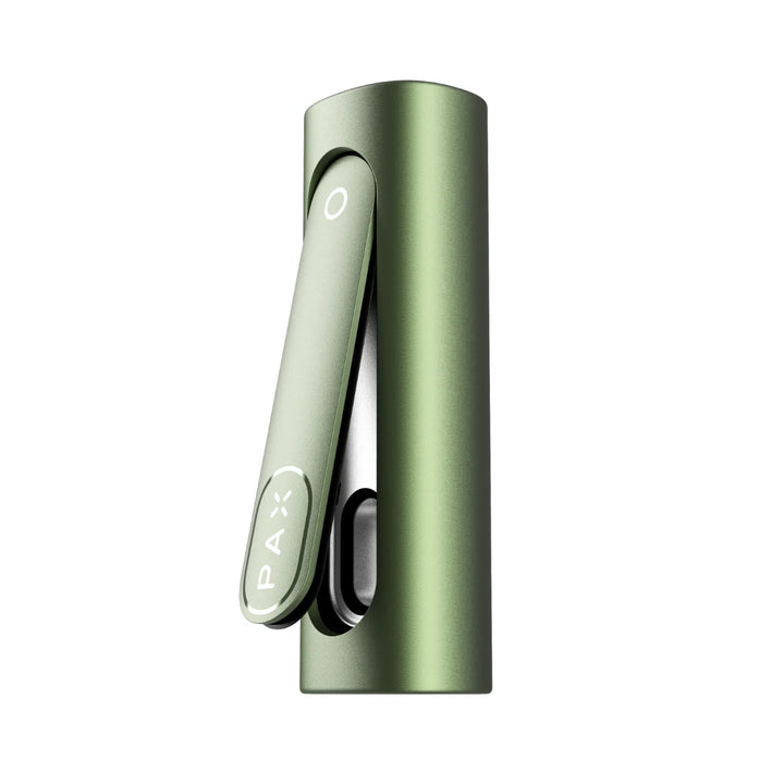 Close-up detail shot of a sleek, cylindrical green portable dry herb vaporizer with a lighter green pivoting mouthpiece featuring the 'PAX' logo.