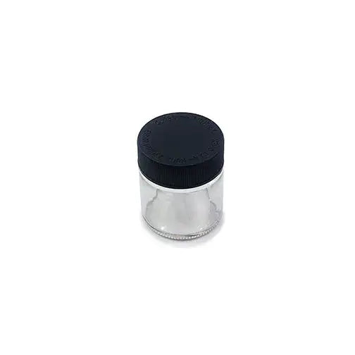 A small, clear glass jar with a black screw-on lid, shown from a slightly elevated angle on a plain white background.