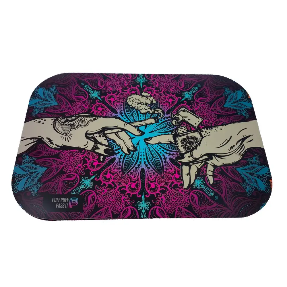 A rectangular metal rolling tray with rounded corners featuring a vibrant psychedelic mandala pattern in magenta and teal. The central artwork depicts two hands reaching towards each other, one holding a lit joint and the other a lighter, with 'PUFF PUFF PASS IT' text in the bottom left corner.