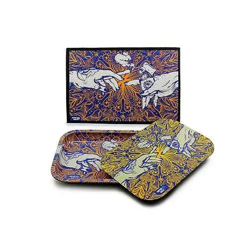 A rectangular moodmat and a matching rolling tray with a lid, both featuring an intricate design of two hands reaching towards each other with a smoking theme, displayed against a white background. The tray is partially covered by its lid, showing the matching artwork.