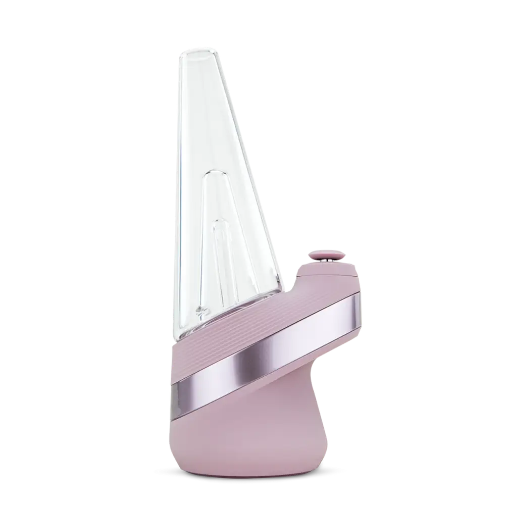 Side view of a blush pink and silver portable vaporizer with a clear, conical glass attachment on top, set against a dark background.