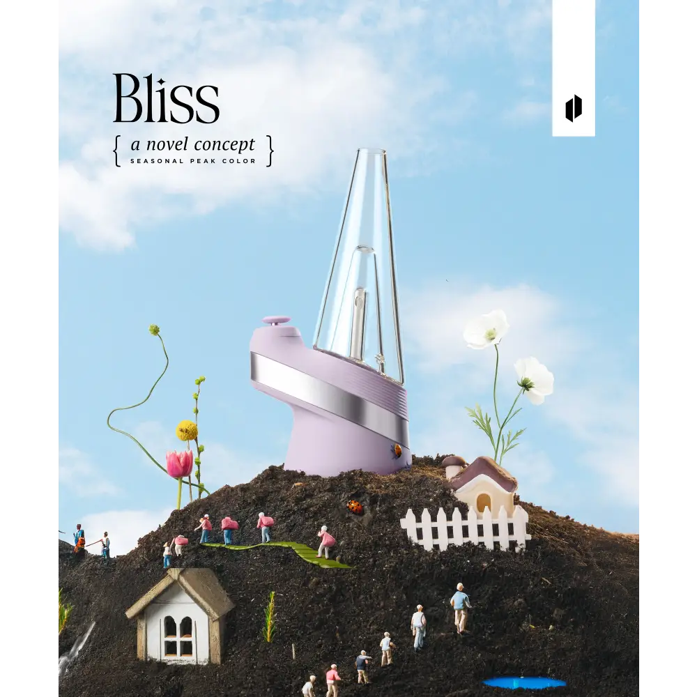 A lavender Puffco Peak vaporizer sits atop a miniature dirt hill with tiny houses, people, and flowers under a blue sky, showcasing the 'Bliss' seasonal color.