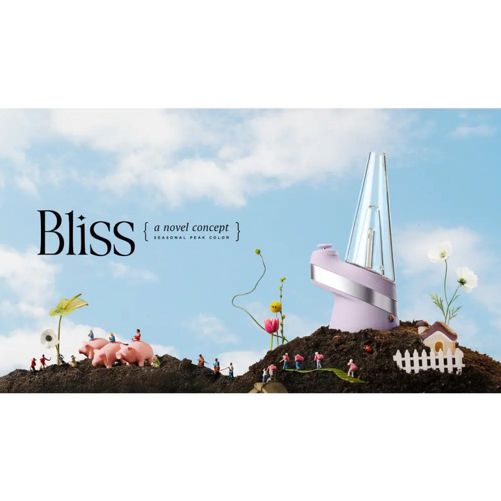 A lavender vaporizer sits on a miniature dirt mound in a whimsical garden scene with tiny people, pigs, flowers, and a small house under a blue sky. Text reads 'Bliss a novel concept seasonal peak color'.