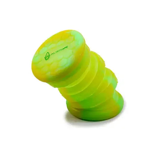 Close-up of a collapsible silicone storage jar, featuring a vibrant yellow-green and lime swirl pattern, with an 'ALIENAPE' logo on the top lid.