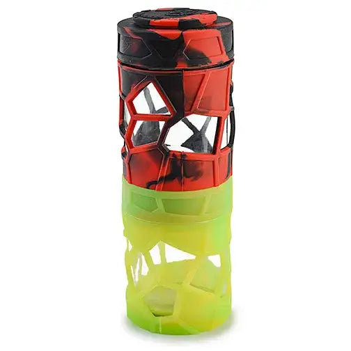 Close-up detail shot of a stackable jar, showing the top red and black marbled silicone section with clear geometric cutouts, and the bottom yellow and green marbled silicone section with similar cutouts.