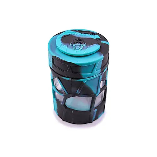 A cylindrical, stackable jar with a teal and black camouflage-like pattern. The lid features a circular logo.