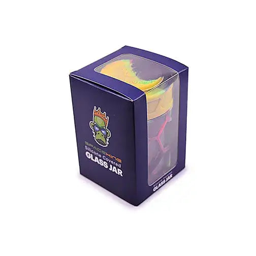 Dark blue retail packaging box with a clear window, showcasing a colorful silicone-covered glass jar inside. The box features a cartoon monkey logo.