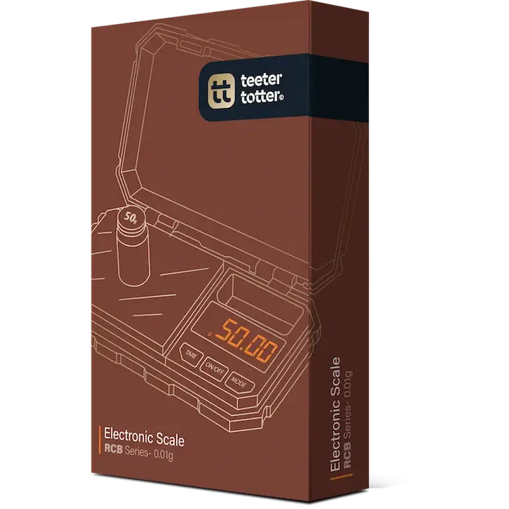 Product packaging for an electronic scale, featuring a brown box with an outline illustration of the scale displaying '50.00' and a 50g calibration weight, with the 'teeter totter' logo at the top.