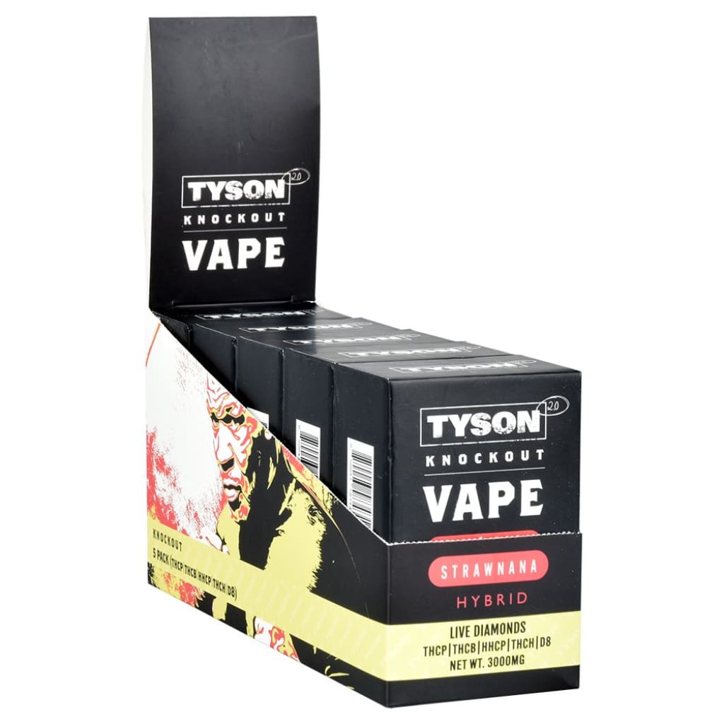 A black display box filled with several black vape pens, featuring 'Tyson Knockout Vape' branding and a graphic of Mike Tyson on the side.