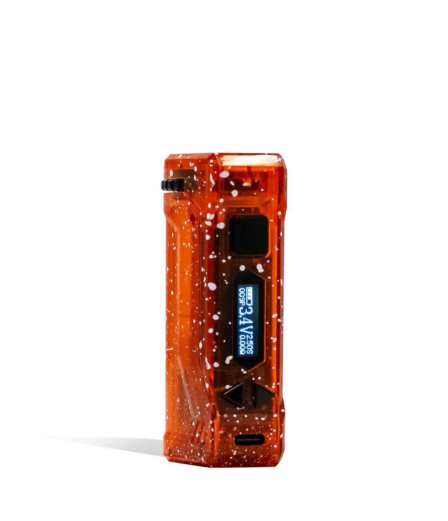Close-up, straight-on view of an orange translucent vaporizer with white speckles, featuring a digital display showing '3.4V' and other metrics.